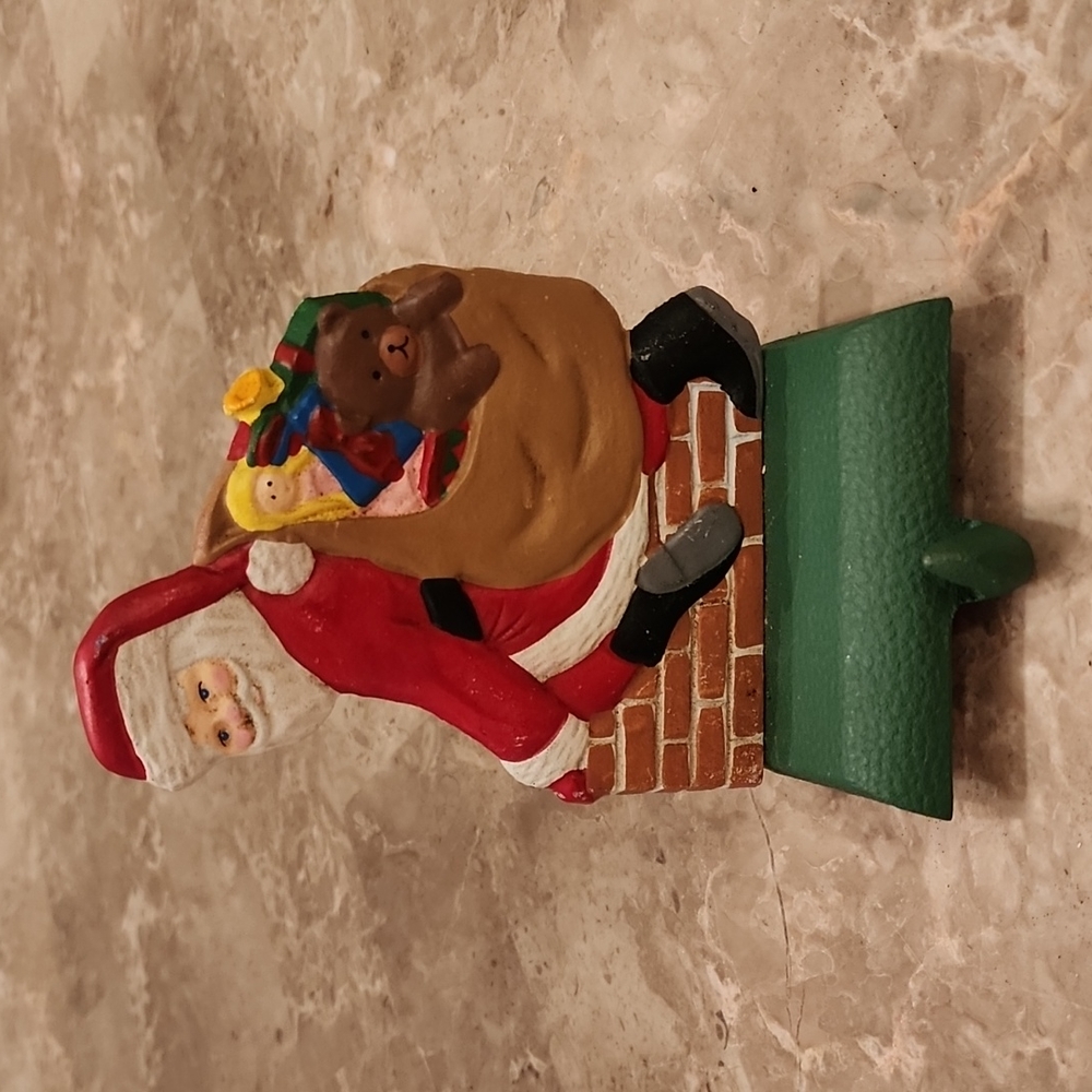 Large cast iron Santa stocking holder, maybe vintage?